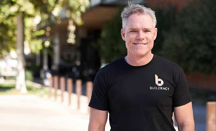 A photo of Buildxact CEO David Murray outside in a Buildxact t-shirt